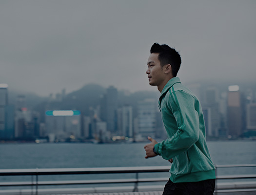 Guy jogging outside to combat depression