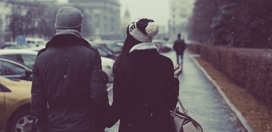 Couple walking in street