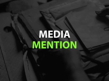 HeadsUpGuys Media Mention, image over man holding papers