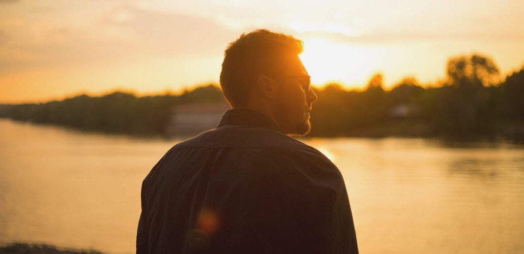 Man's silhouette at sunset