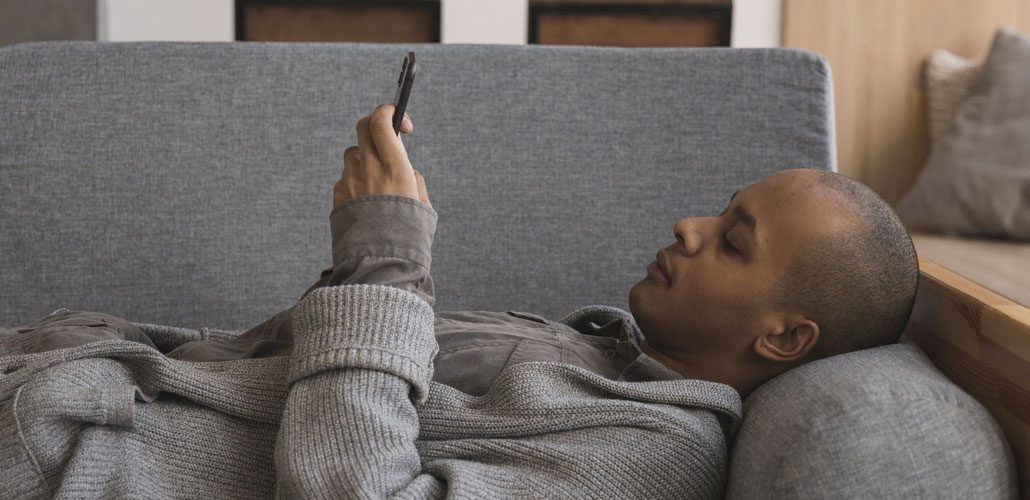 Man talking to therapist on phone