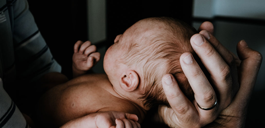 Man holding baby