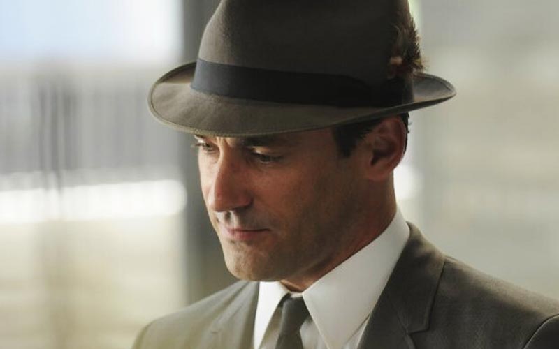 Jon Hamm in hat as Don Draper