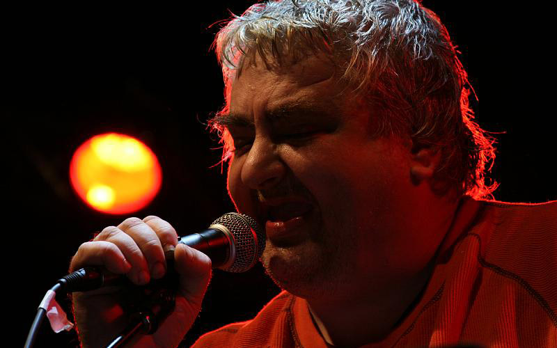 Daniel Johnston performing on stage