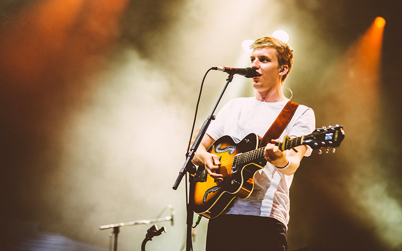 George Ezra performing on stage