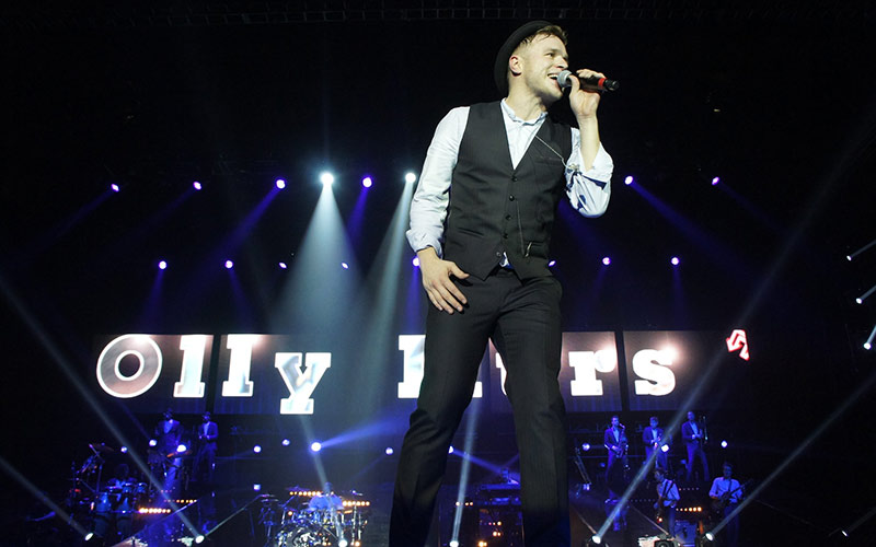 Olly Murs performing on stage